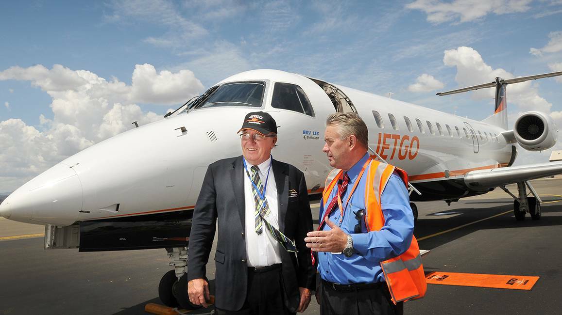 HAPPIER TIMES: Tamworth mayor Col Murray and Jetgo managing director of airlines Paul Bredereck discuss the carrier’s plans to commence flights to Brisbane in 2014. Photo: Gareth Gardner 