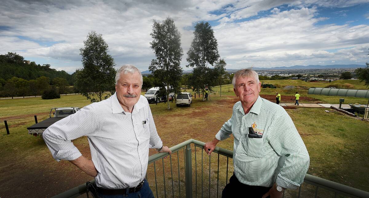 SKY-HIGH: Tamworth Regional Astronomy Club members Garry Copper and Phil Betts are excited to see the centre come to fruition. Photo: Gareth Gardner