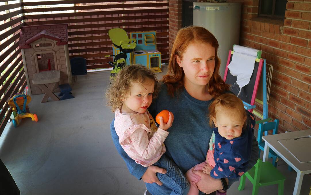 WHAT'S THE RISK: Moonbi mum Kelly Fox with her girls Ayla and Evie. Photo: Gareth Gardner 080916GGA06