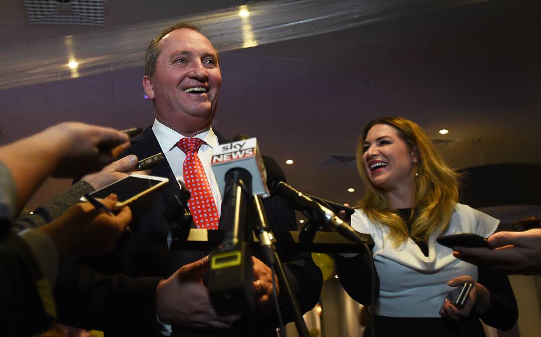 Tight lipped: Barnaby Joyce with his former staffer Vikki Campion after he won the 2016 election. Photo: Gareth Gardner