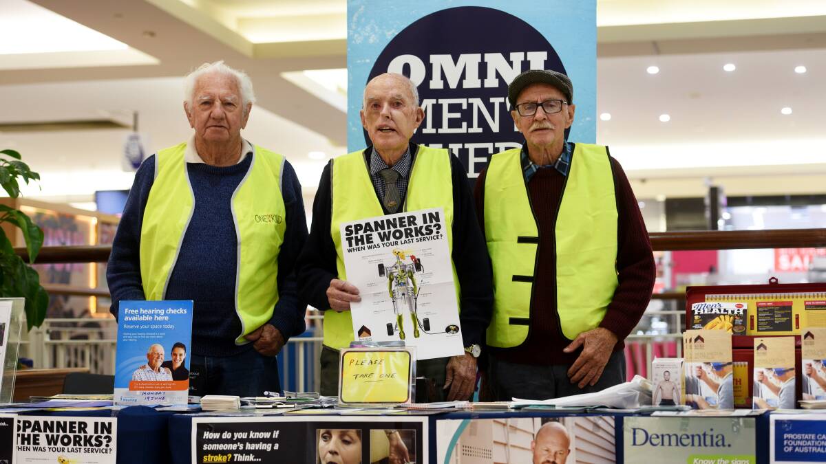 BACKING MEN'S HEALTH: Keith Lewin, Jim Finucane and Mick Morley handing out information at Shopping World in Tamworth for Men's Health Week. Photo: Gareth Gardner 160617GGC02