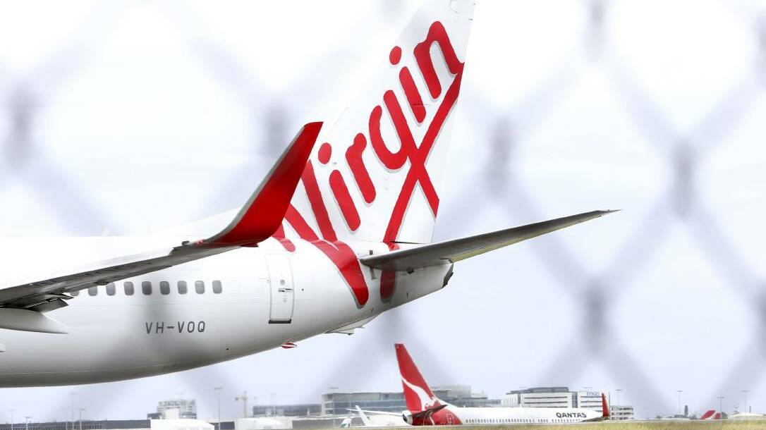 Virgin sends cadet pilots to Adelaide over Tamworth, as talks drag on