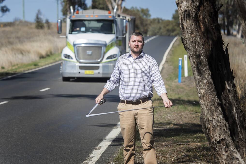 DANGER: SFF Tamworth candidate Jeff Bacon says the road is in a deplorable state, with many trees dangerously close to the side of busy thoroughfare. Photo: Peter Hardin