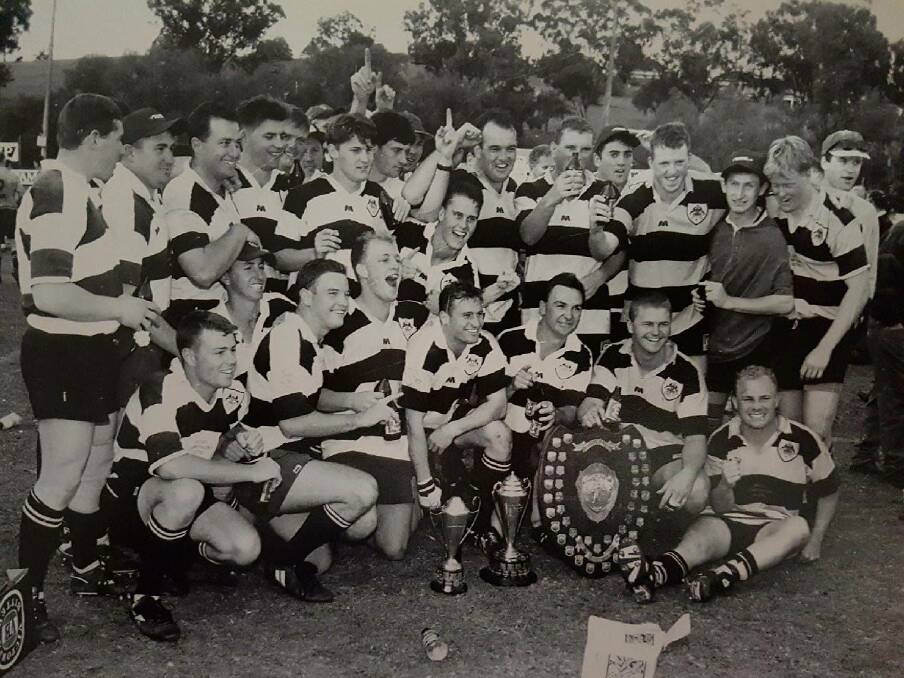 The Tamworth Magpies 1996 team celebrates its grand final win over Pirates.