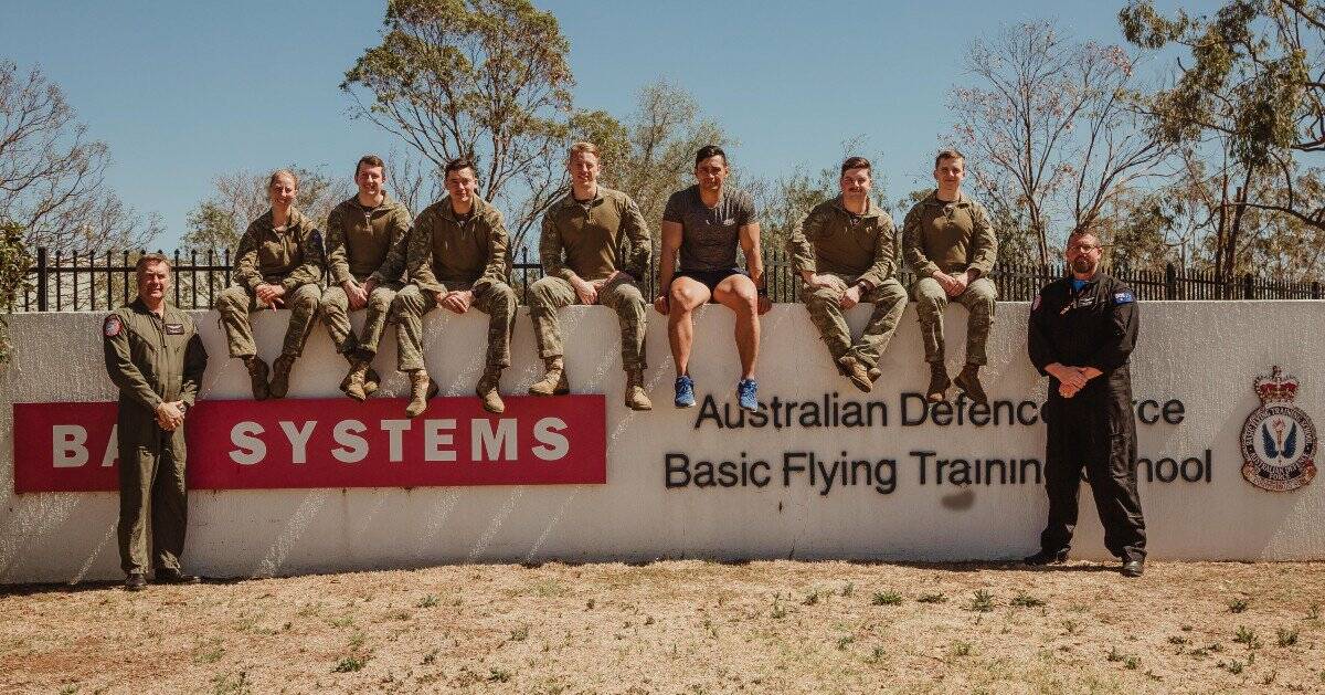 SIGNING OFF: The final batch of ADF pilots celebrate their graduation from Tamworth Flight School. Photo: BAE Systems