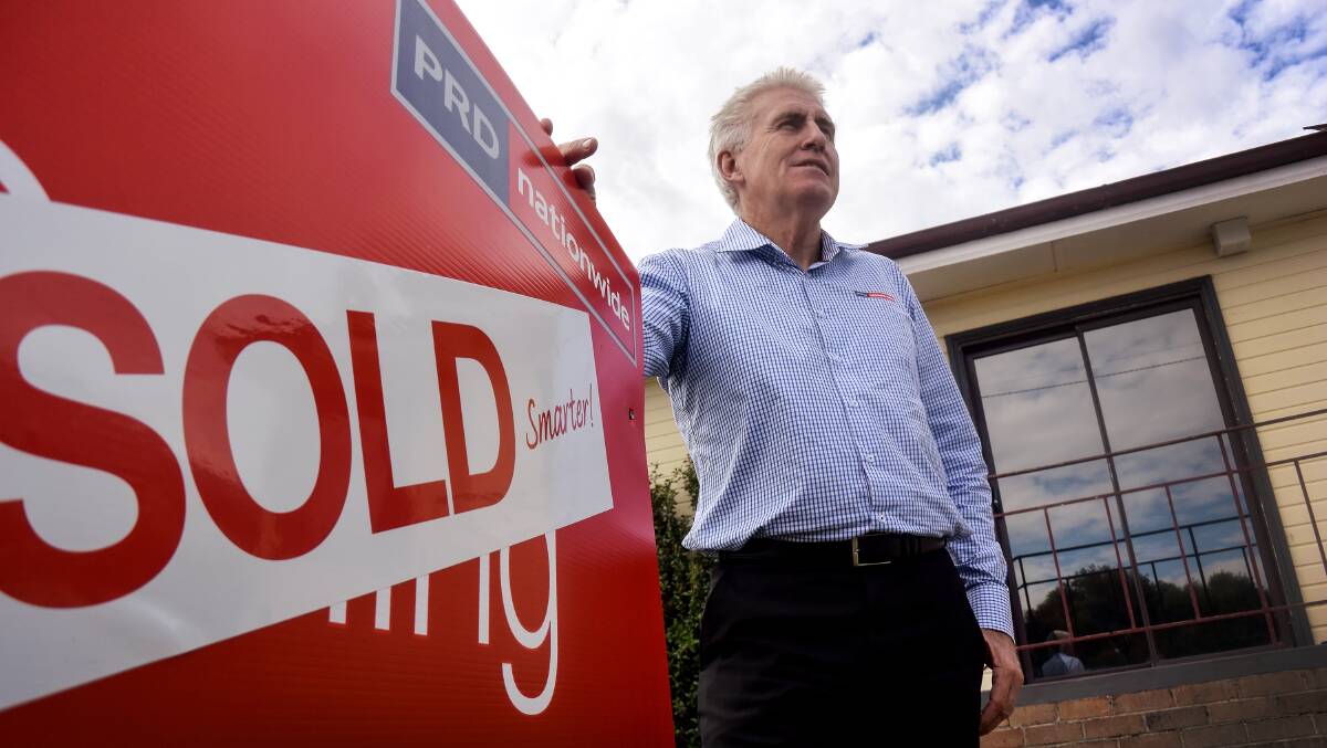 HOT PROPERTY: Dean Cummings at a recently sold house in West Tamworth. Photo: Jamieson Murphy