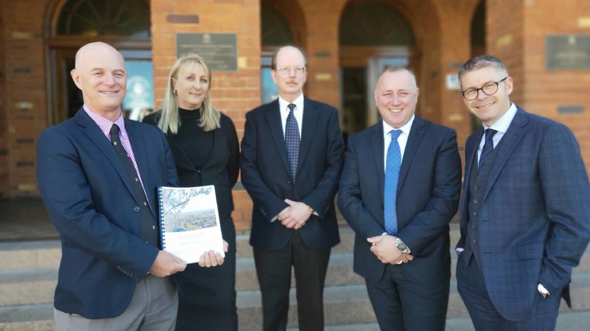 HEFTY DOCUMENT: The uni reference group, from left, Mitch Hanlon, Jacqui Powell, Stephen Maher, Jye Segboer and Mark Woodley. Photo: Tamworth Business Chamber