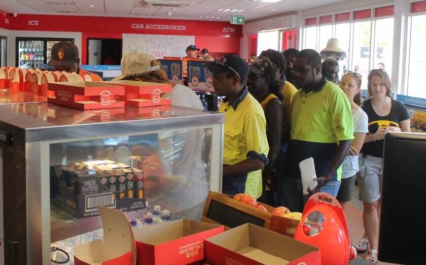 OH THE JOY: Lining up for pies at the opening of Pie Face in Katherine, NT. Picture: Lydia Lynch.