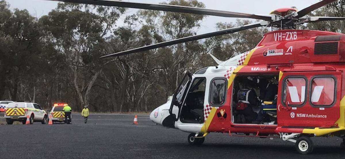 Emergency mission: The Westpac chopper on the scene of the crash north of Tamworth. Photo: Westpac Rescue Helicopter