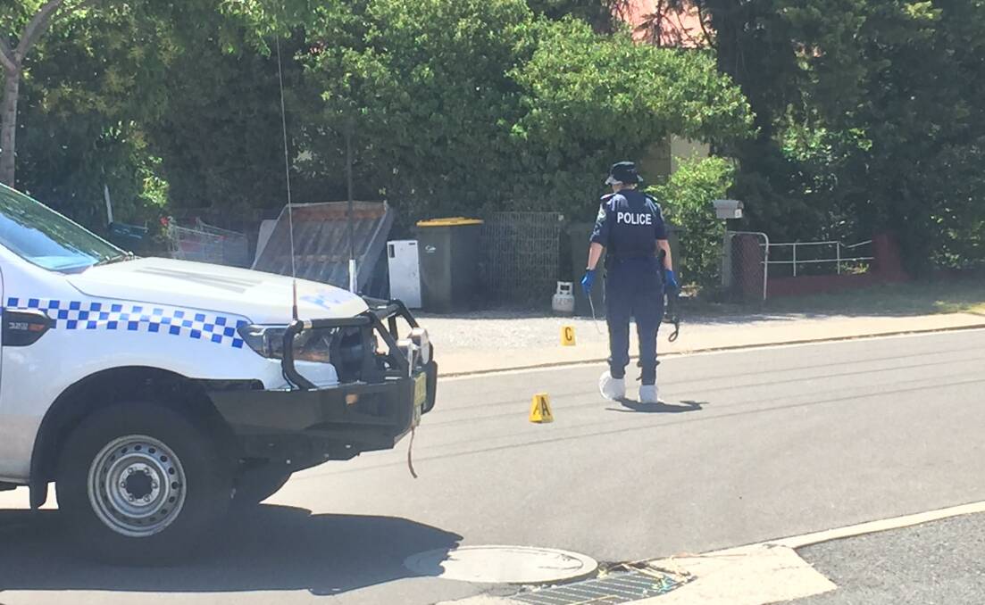 Police and forensic crews remain at the scene in North Tamworth. Photos: Breanna Chillingworth