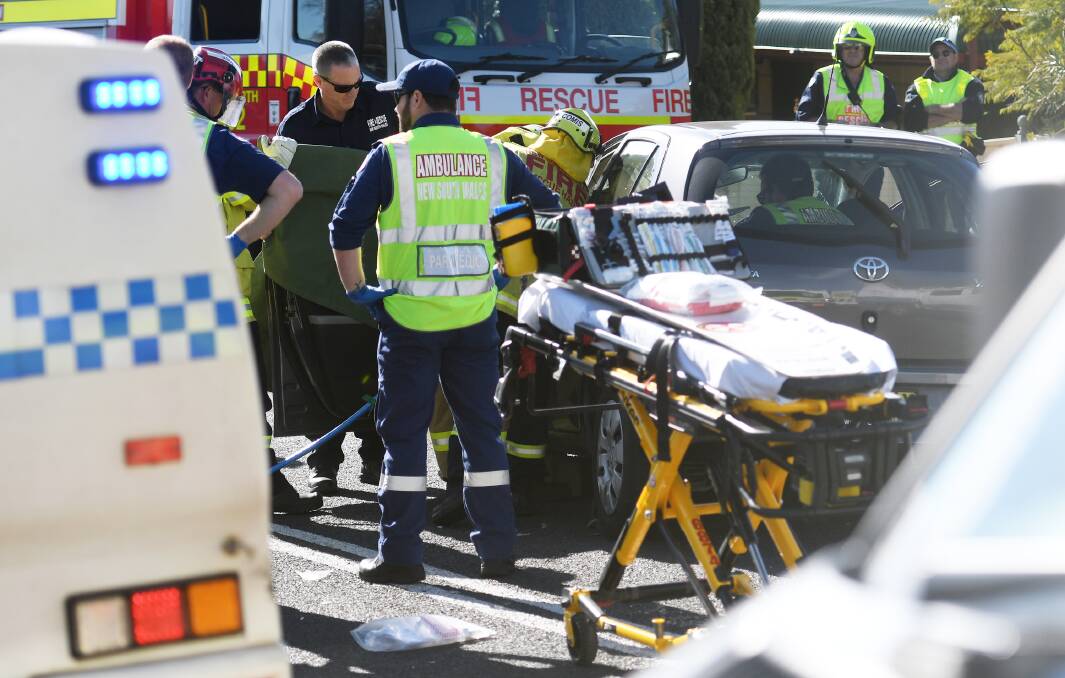 Paramedics and police at the scene of the crash in Church Street, Tamworth on Wednesday. Photos: Gareth Gardner