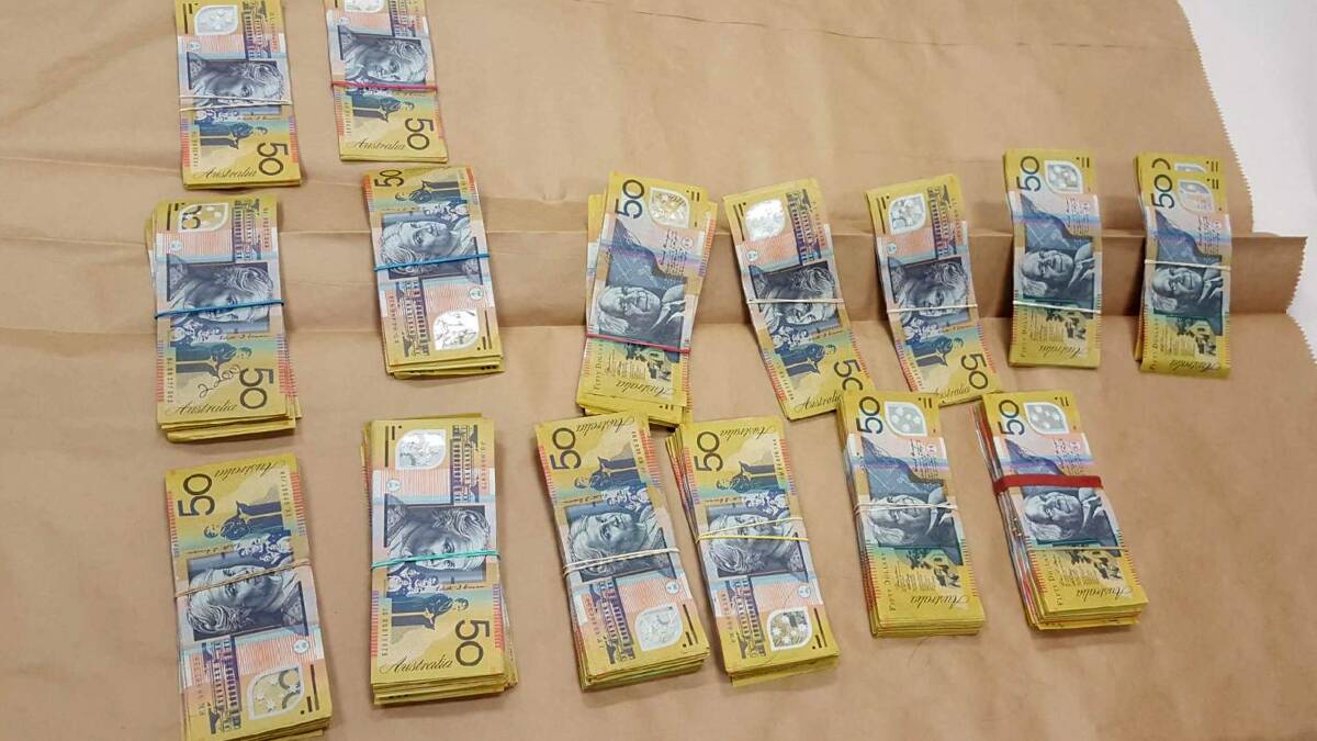 Money seized: Police allege they found more than $35,000 in cash in a car linked to Ben Woodard on Sunday. 