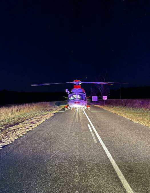 Emergency transfer: The Westpac chopper on scene at Ashford, near Inverell. Photo: Westpac Rescue Helicopter Service