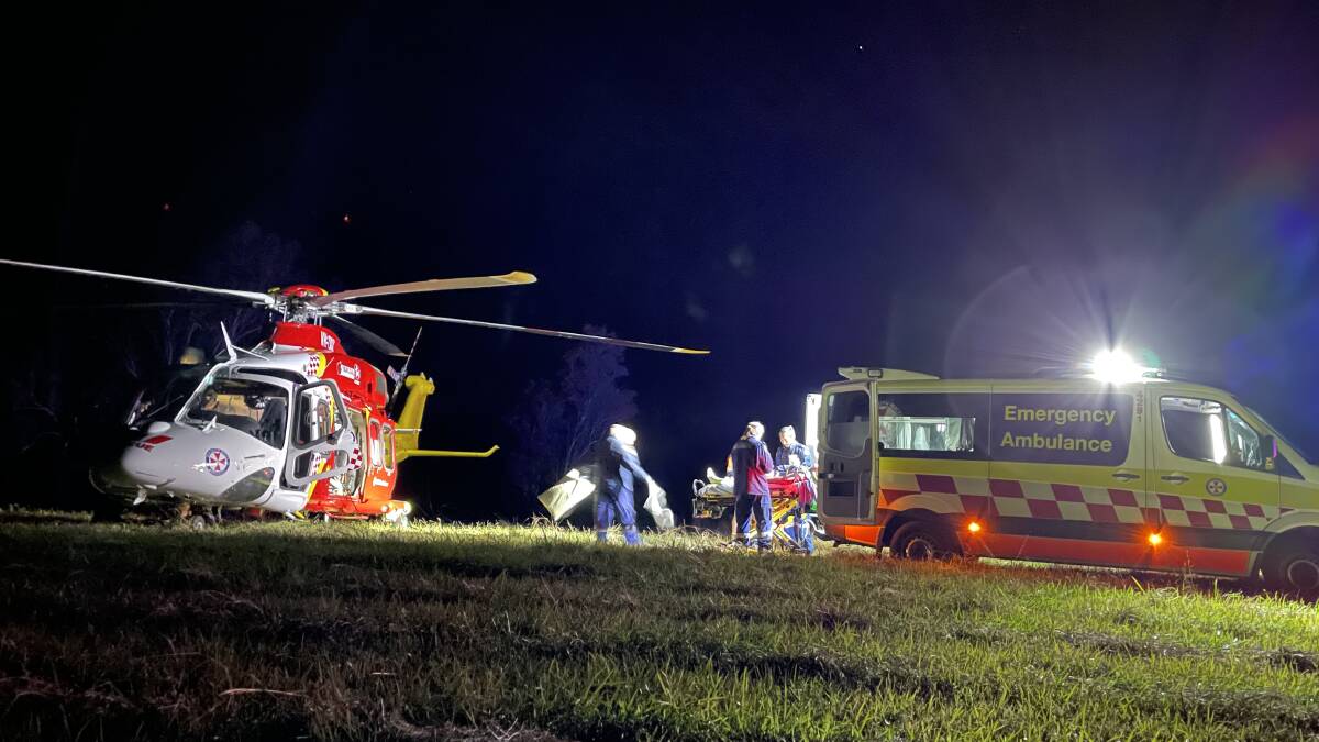 Mission: The Westpac helicopter and paramedics at the Coneac property on Monday night. Photo: Westpac Rescue Helicopter