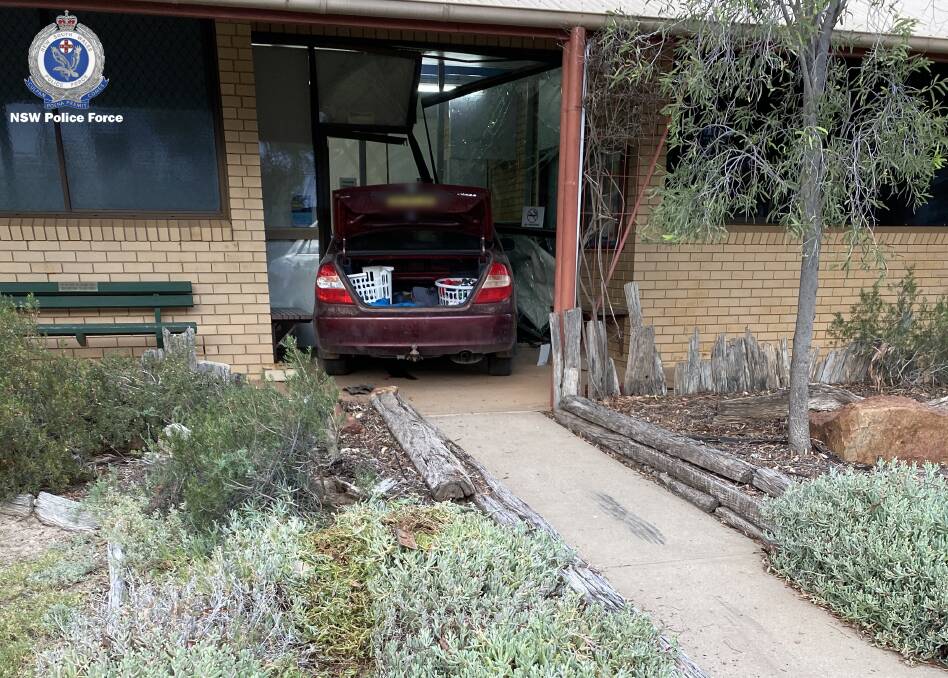 Major damage: A man has been refused bail after a car slammed into the Lightning Ridge Police Station on Tuesday. Photo: NSW Police