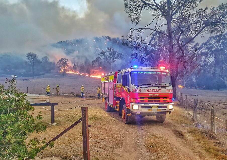 Fire and Rescue NSW firefighters near Tenterfield during the Black Summer bushfires. Picture from file