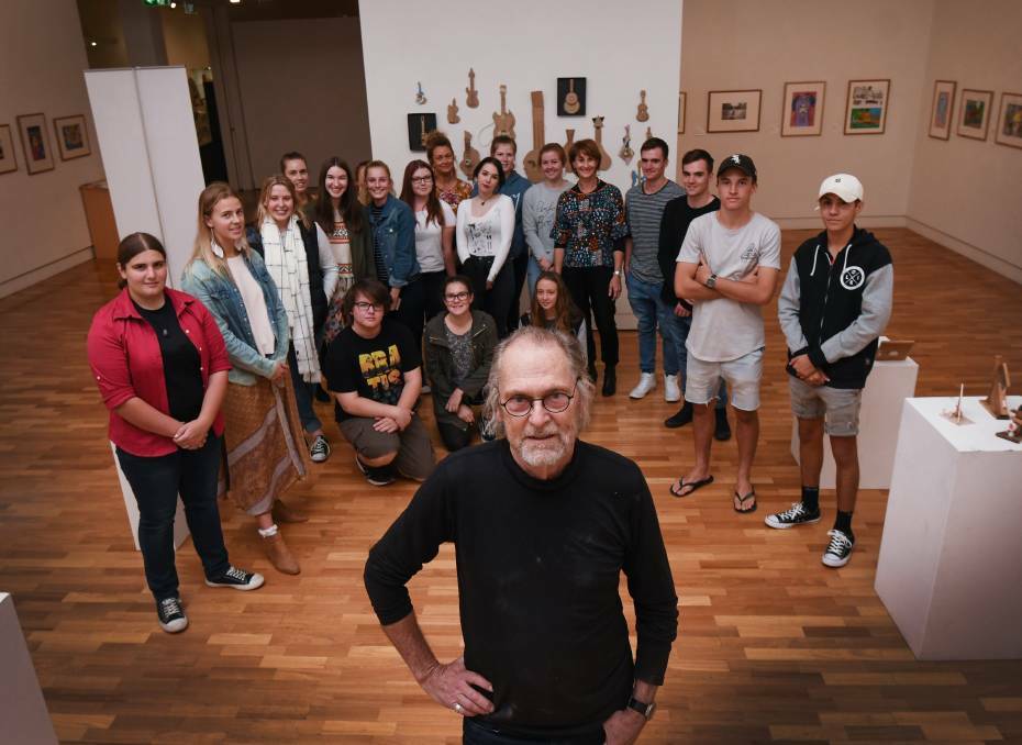 Final lesson: Local artist and sculptor Peter Hooper gave one final lesson in May to local students before packing up for a Sydney retirement. Photo: Gareth Gardner