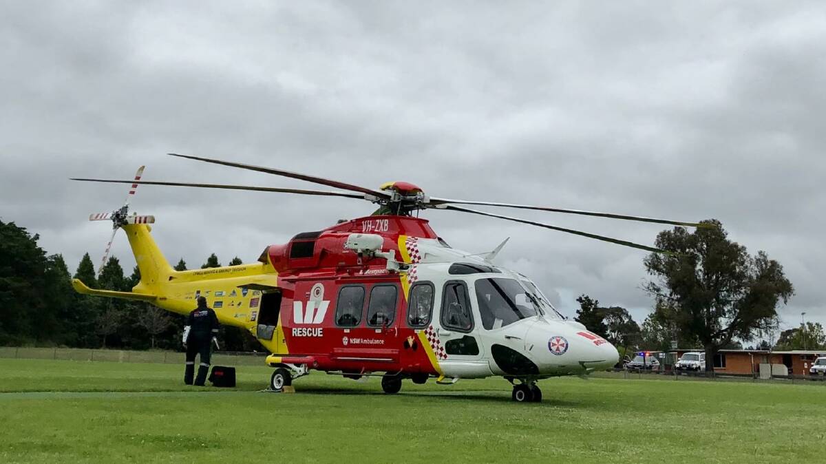 Rescue mission: The Westpac Rescue Helicopter on scene in Uralla on Tuesday afternoon. Photo: Westpac Rescue Helicopter Service