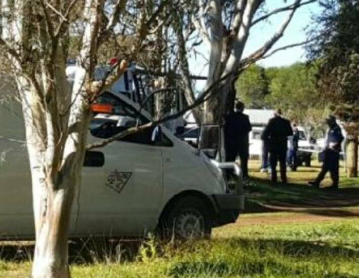 Murder scene: Police and detectives on the outskirts of Armidale in June 2017 after the 43-year-old man's body was discovered in the backyard.