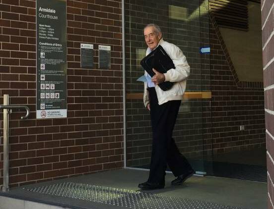 Behind bars: David Joseph Perrett outside Armidale Local Court in 2017. He now faces 139 charges of historical child sex abuse.