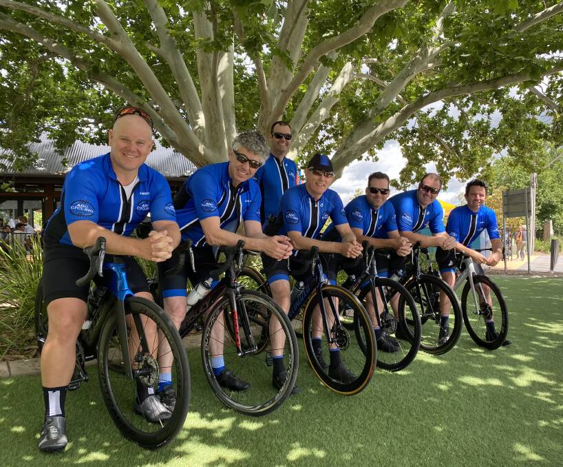 Ready to ride: Some of the cyclists, and some of the trainers, helping to get the riders ready for the epic trek. Pictured from left: Shane Ruttley, David Lord, Hugh Humphries (back), Brian Wall, Simon Tolhurst, Jarrad Cotterell and Hugh Locke.