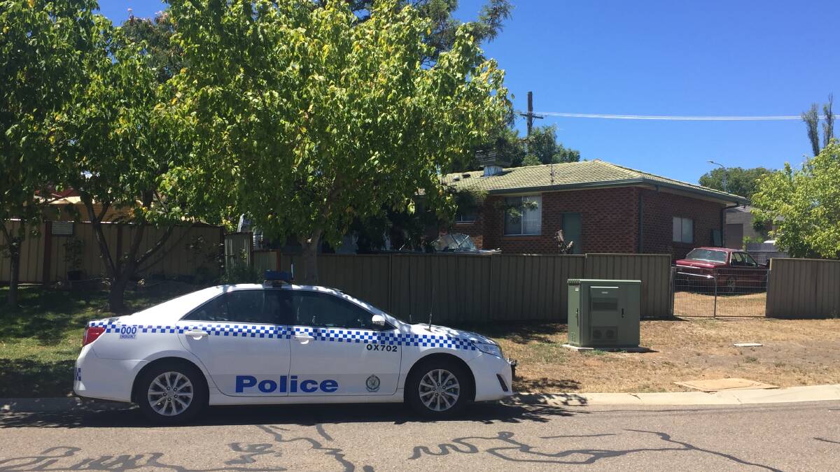 Five raids: Officers at the Higgins Lane property in Oxley Vale where drugs were seized - one of five locations searched.