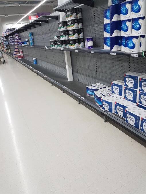 Stock shortage: The bare shelves in Woolworths in Tamworth on Wednesday night. Photo: Supplied
