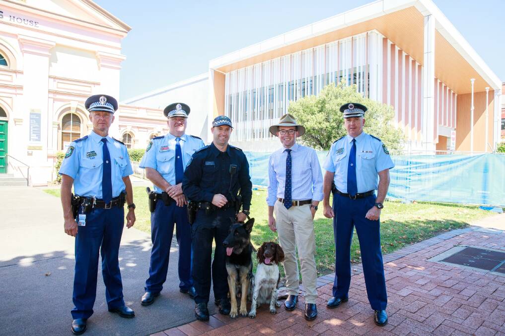 New England Police District Commander Superintendent Steve Laksa, left, Inverell On paw patrol: Officer-in-Charge Chief Inspector Rowan OBrien, Dog Handler Senior Constable Chris Hill, Police Dog Atlas (General Purpose), Police Dog Wags (Cadaver/drug detection), Northern Tablelands MP Adam Marshall and Acting Assistant Commissioner Peter McKenna. Photo: Supplied