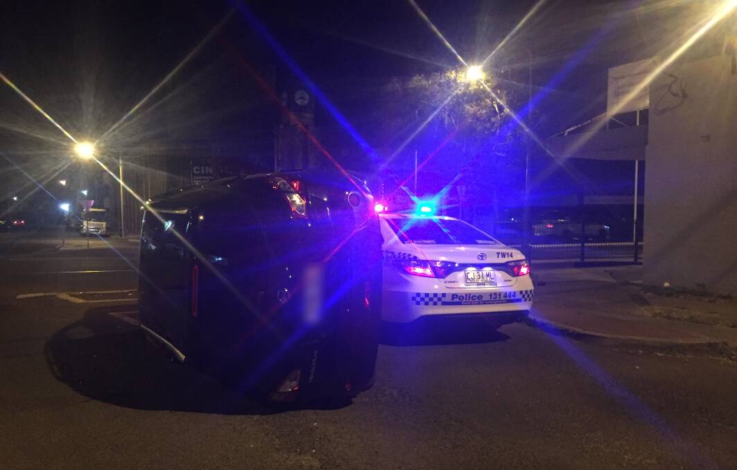 No serious injuries: The force of the crash at the intersection of Bridge and Hercules Streets in Tamworth on Tuesday night caused the Nissan to flip on its side.