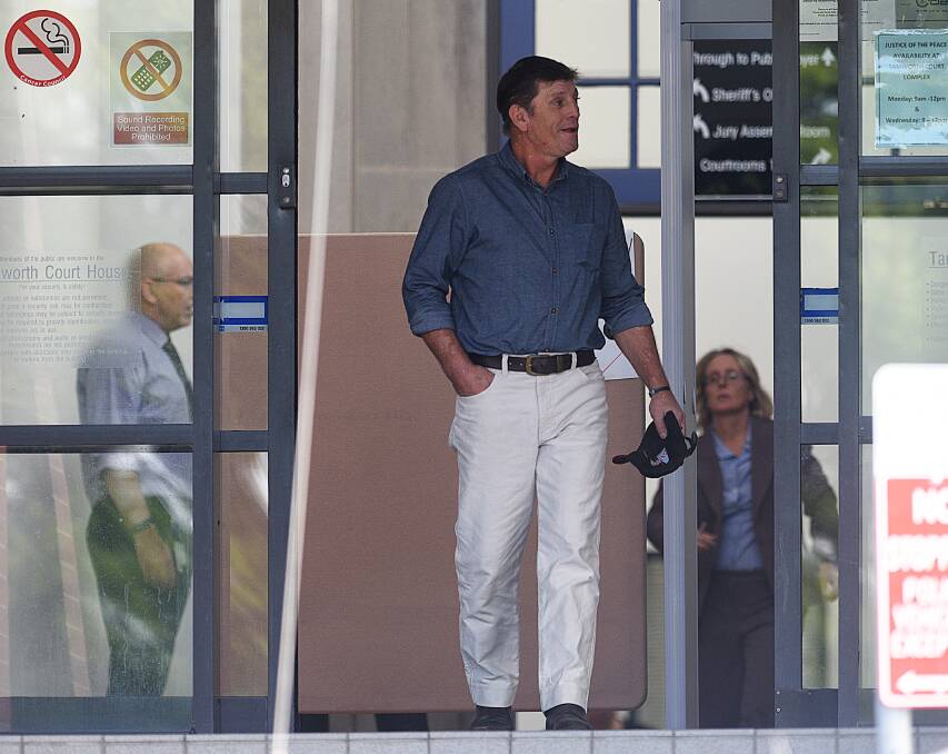 Headed to trial: Raymond Harland Hubbard leaves Tamworth court on Wednesday after appearing on charges stemming from a backyard explosion. Photo: Gareth Gardner