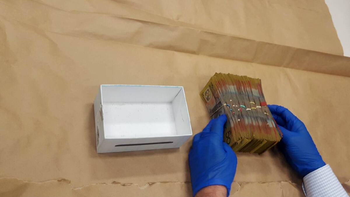 Cash, drugs, phones and other goods seized in raids in Woolomin and Upper St, Tamworth. Photos: Breanna Chillingworth