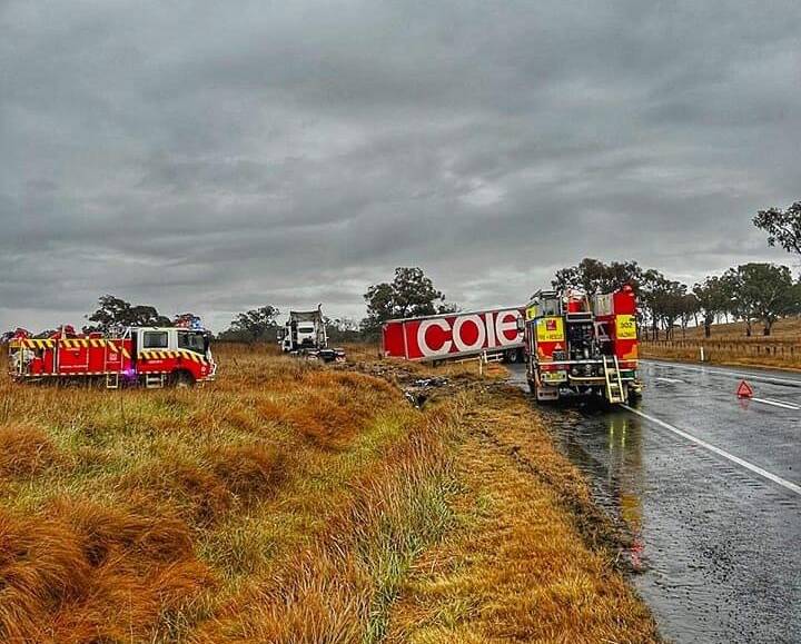 Emergency services at the scene on the New England Highway. Picture supplied by Fire and Rescue NSW 