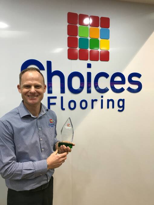 Winning roll: Wayne Garnett has been named the Choices Flooring NSW/ACT storeperson of the year, after the Tamworth store won a Business Chamber award.