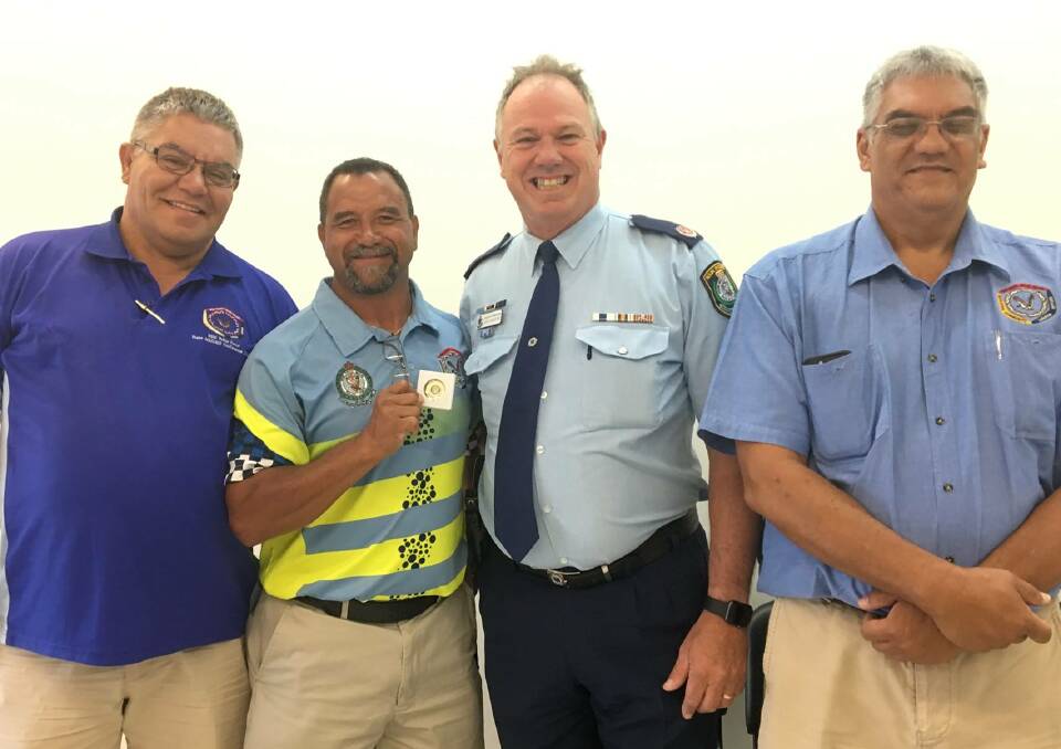 All smiles: Fellow Aboriginal Community Liaison officers Ross Jenkins, left, and David Roberts, right, with Willie Middleton and Geoff McKechnie. Photo: NSW Police