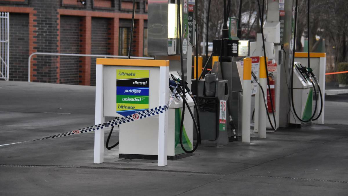 Crime scene: Police are searching for a man who robbed the BP on the corner of Dumaresq and Marsh streets on Tuesday afternoon. Photo: Andrew Messenger