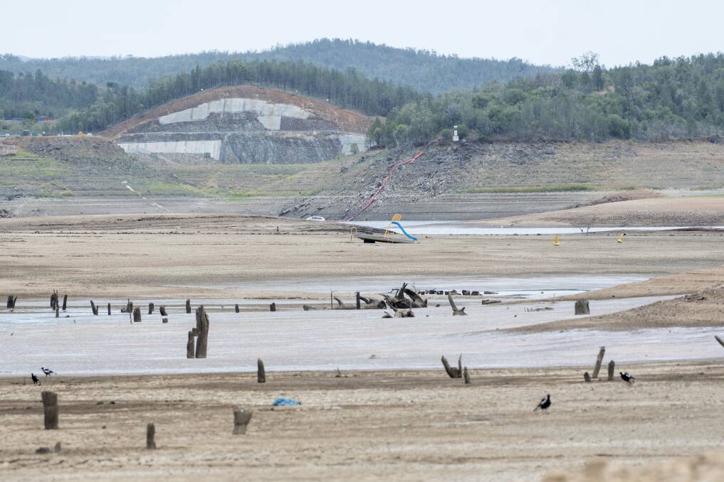 Dry times: Keepit Dam is dry and barren after record low inflows in past years. Photo: Peter Hardin 101218PHC162
