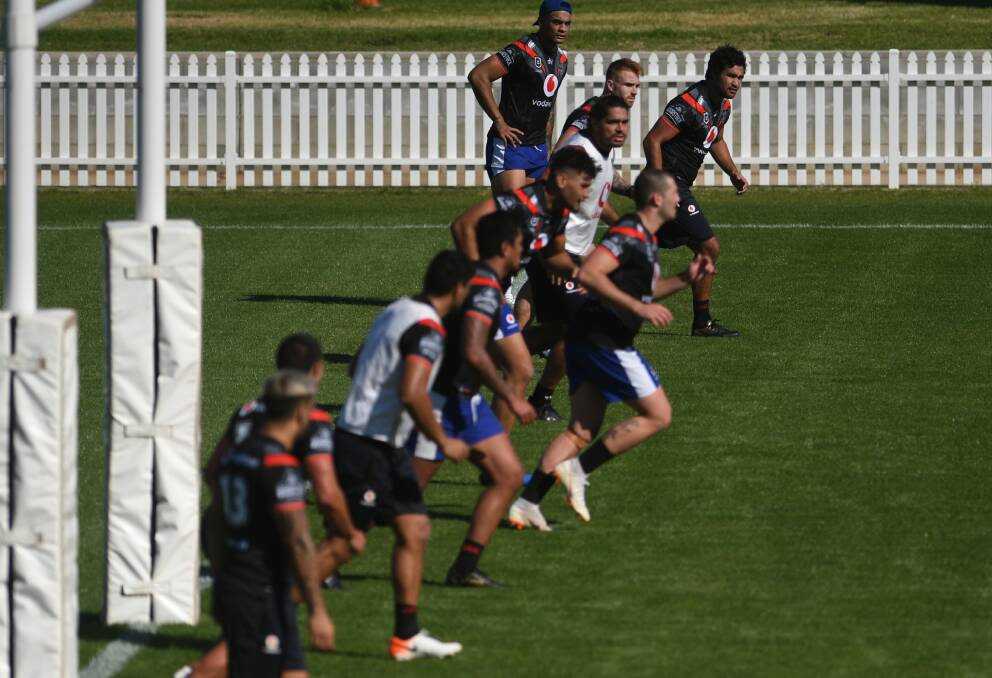 Back on the paddock: The New Zealand Warriors take to the field at Scully Park in Tamworth on Tuesday in their first run in the city. Photo: Gareth Gardner