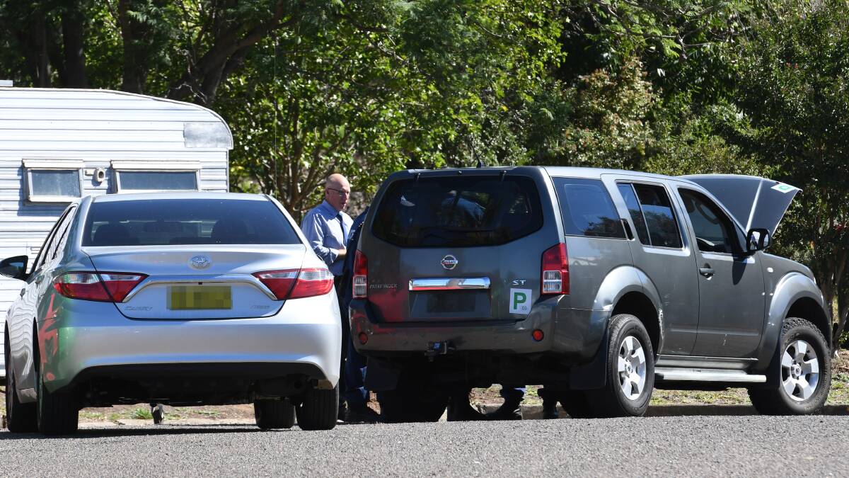 Police at the scene of the arrest in Somerset Place, Nemingha, off Armidale Road, on March 12. Photos: Gareth Gardner