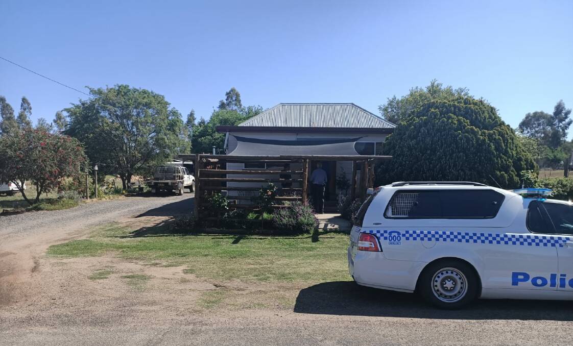Police raid the Warialda home on Thursday as part of the long-running investigation. Photo: Supplied