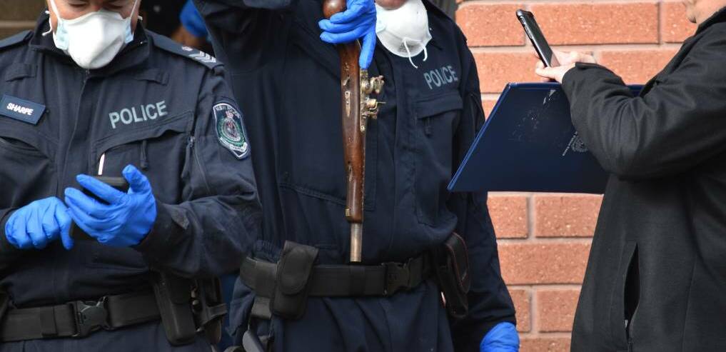 Gun haul: Police seized almost a dozen guns, like this one uncovered in a 2019 Tamworth raid, as part of the Strike Force Radius investigation. Photo: Ben Jaffrey 