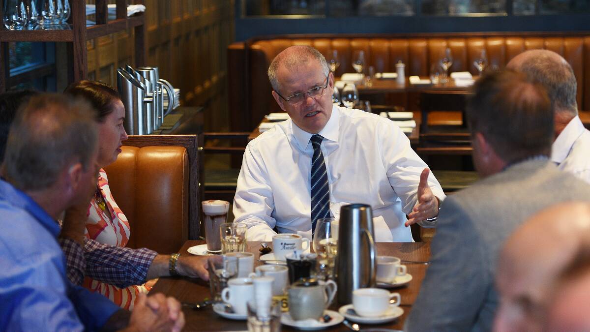 Tamworth talks: Federal treasurer Scott Morrison meets local businessmen and women for breakfast at the Hotel Powerhouse on Sunday morning. Photo: Gareth Gardner