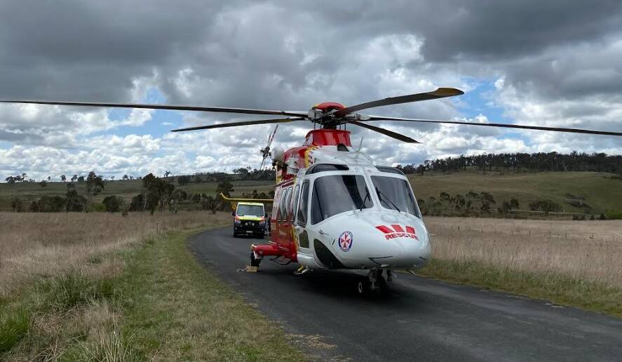 The Westpac Rescue Helicopter on scene near Uralla on Saturday morning with paramedics. Picture by WRHS