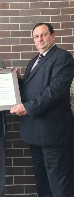 Honoured: Magistrate Michael Holmes, pictured in Armidale, has been awarded an Order of Australia Medal (OAM) for services to the law and the community.