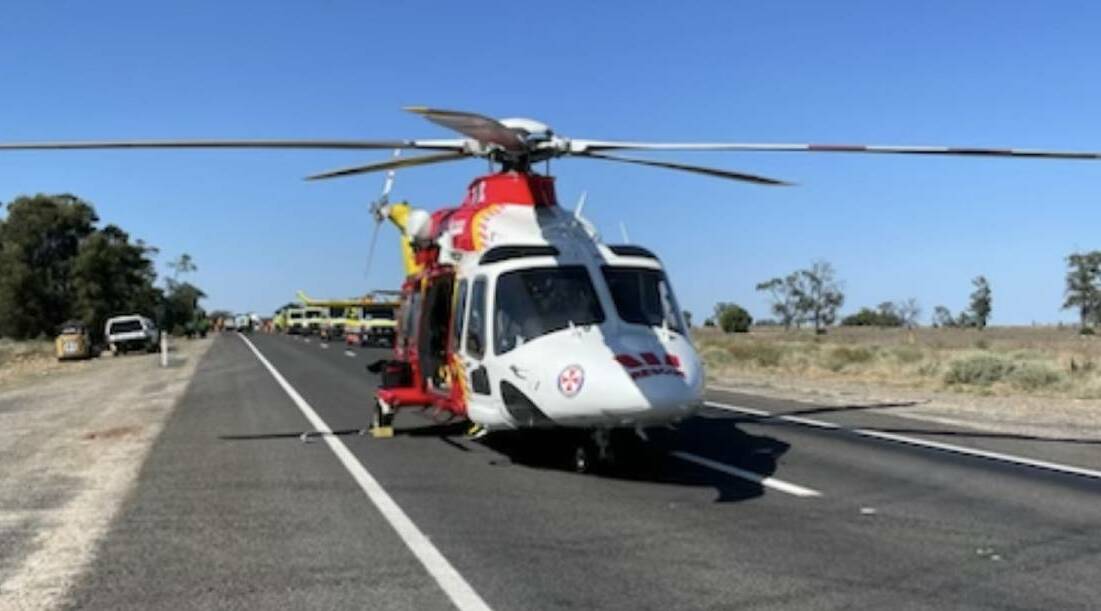 Multiple ambulances and the Westpac chopper at the crash site on the Newell Highway, north of Moree, on the morning of March 6. Picture supplied by the Westpac Rescue Helicopter