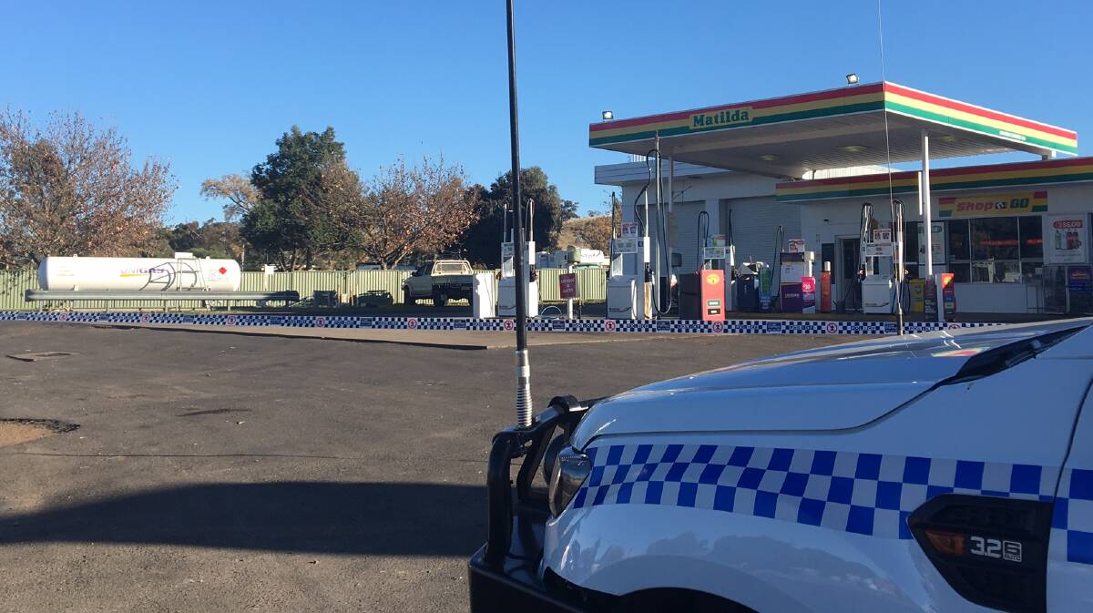 Crime scene: Oxley police at the scene of the armed robbery at the Matilda Service Station on Thursday morning. Photo: Haley Craig