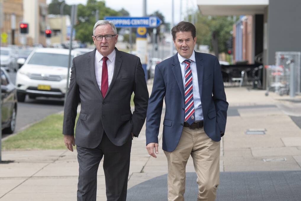 Tamworth visit: NSW Minister for Health Brad Hazzard and Tamworth MP Kevin Anderson outside the city's ambulance station on Tuesday. Photo: Peter Hardin