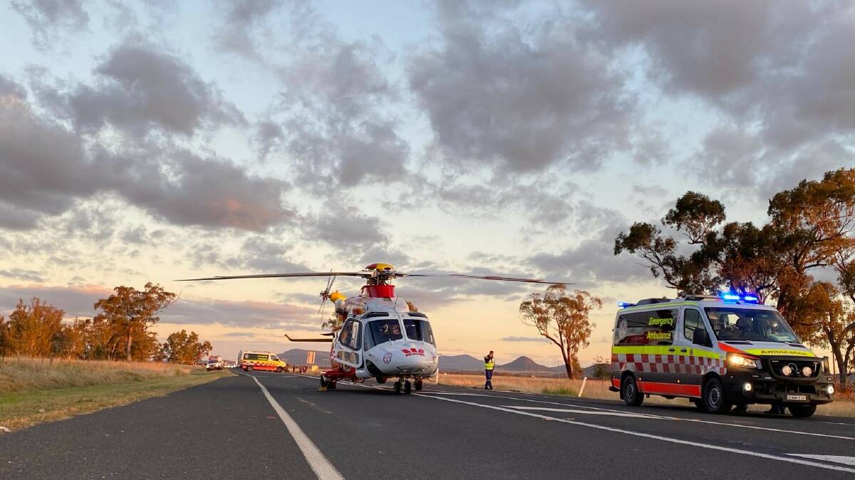 Emergency mission: The Westpac Rescue Helicopter at the scene near Gunnedah on Friday afternoon. Photo: WRHS