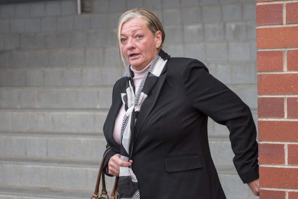 Jailed: Linda Gaye Woods leaves Tamworth District Court in June after pleading guilty to fraud. Photo: Peter Hardin