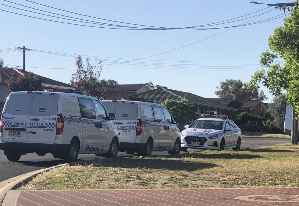 Search warrant: General duties police as well as the TAG team and dog squad raided the Craigends Lane, Tamworth property on Tuesday afternoon. Photo: Haley Craig