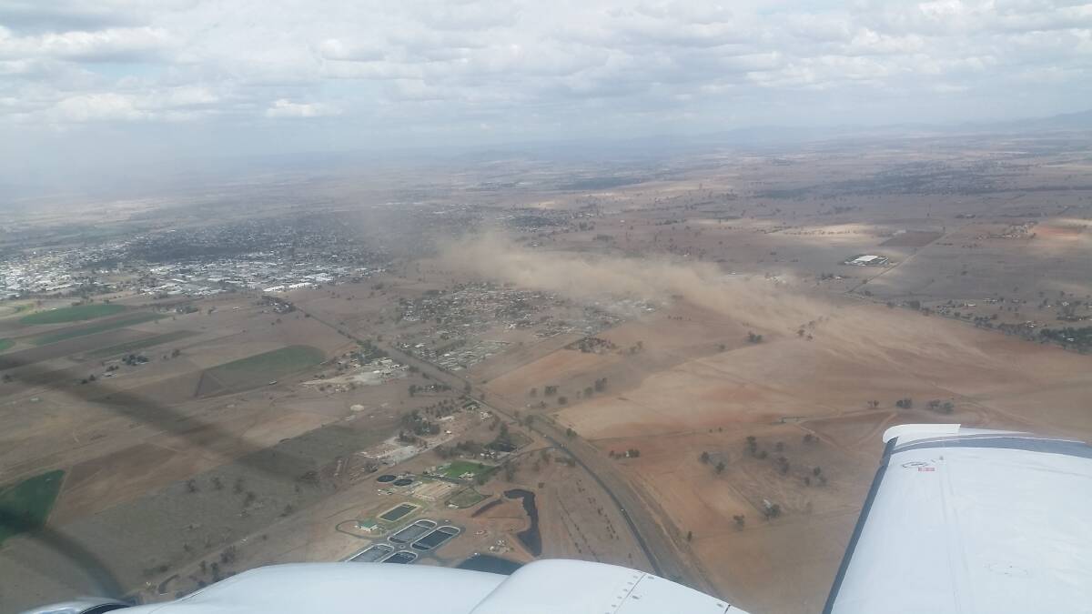 WINDY TIMES: The dust storm above the Westdale area in Tamworth on Thursday afternoon. This photo was captured by Airspeed Aviation pilot Pascal Cooney as he flew from Dubbo to Tamworth.
